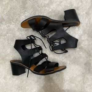 Strappy black heeled sandals